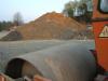 Bild: Walze und Erdhaufen
